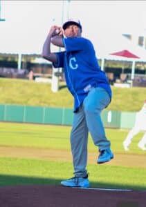 Cameron is an advocate for going on adventures, even if those adventures are not what you'd normally associate with someone with vision loss. This photo is of him on the pitchers' mound at Kauffman Stadium, where he threw out the first pitch during a game. 