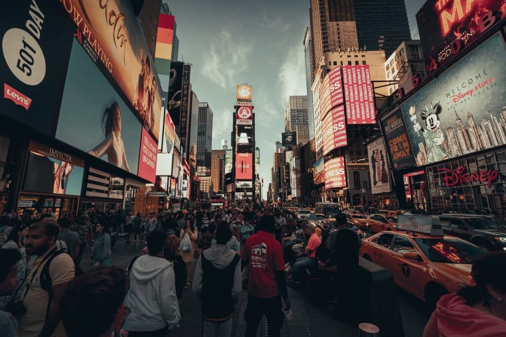 New York, near Times Square, with a rush of people and cats. 